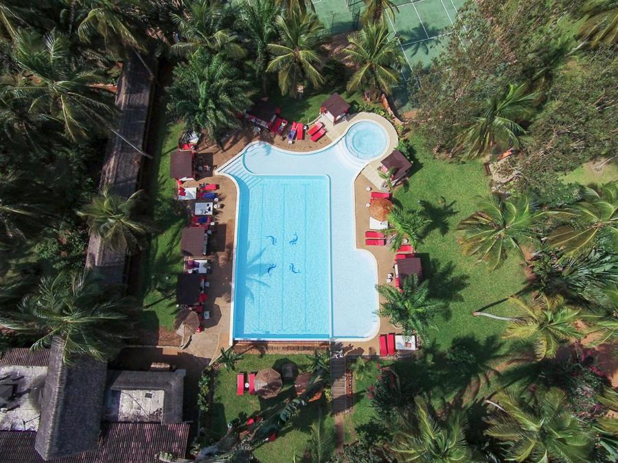 Hotel Coucoue Lodge Ассини-Мафия Экстерьер фото